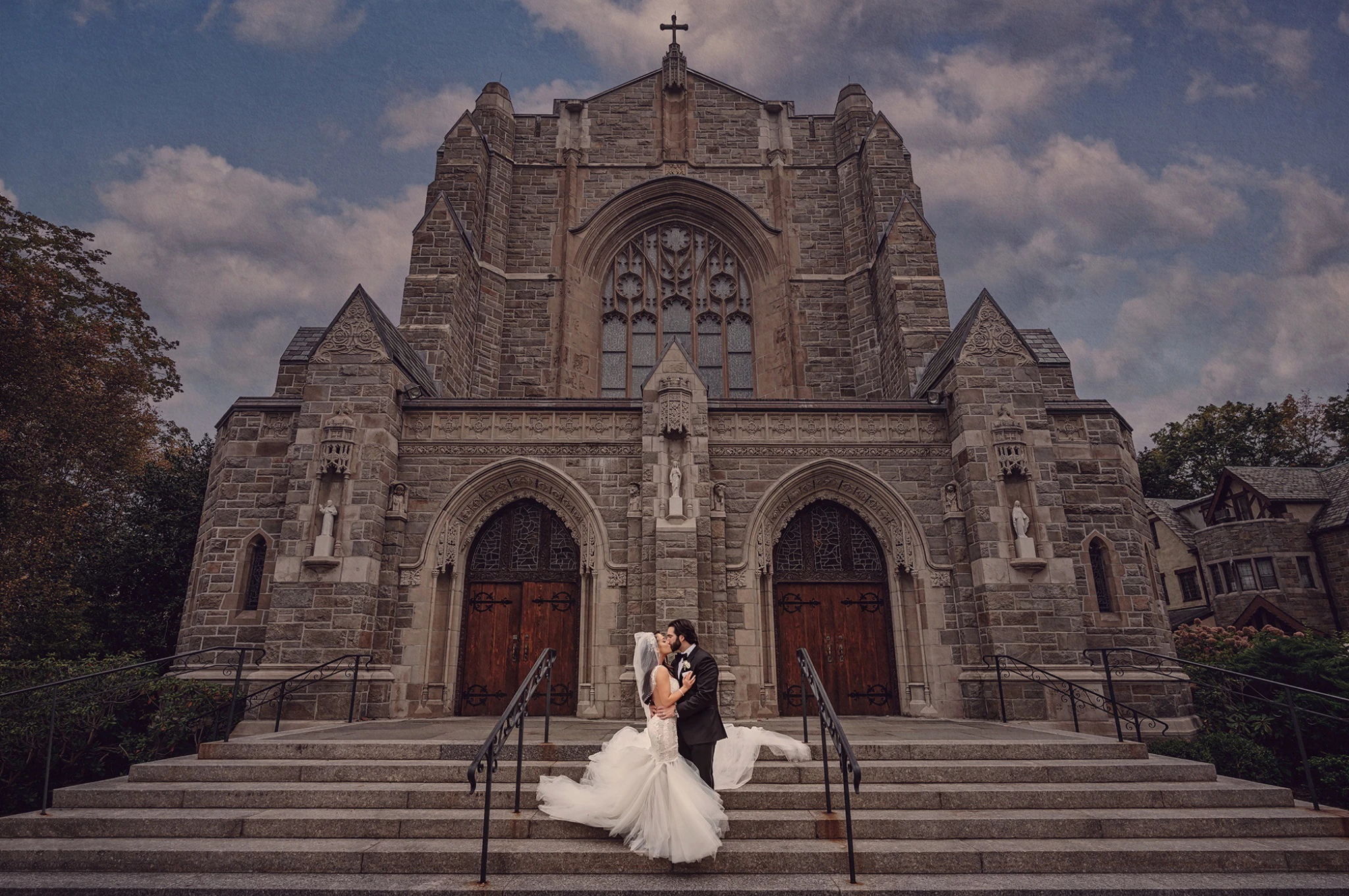 wedding photo of bride and groom at Rye, NY wedding standing in front of church