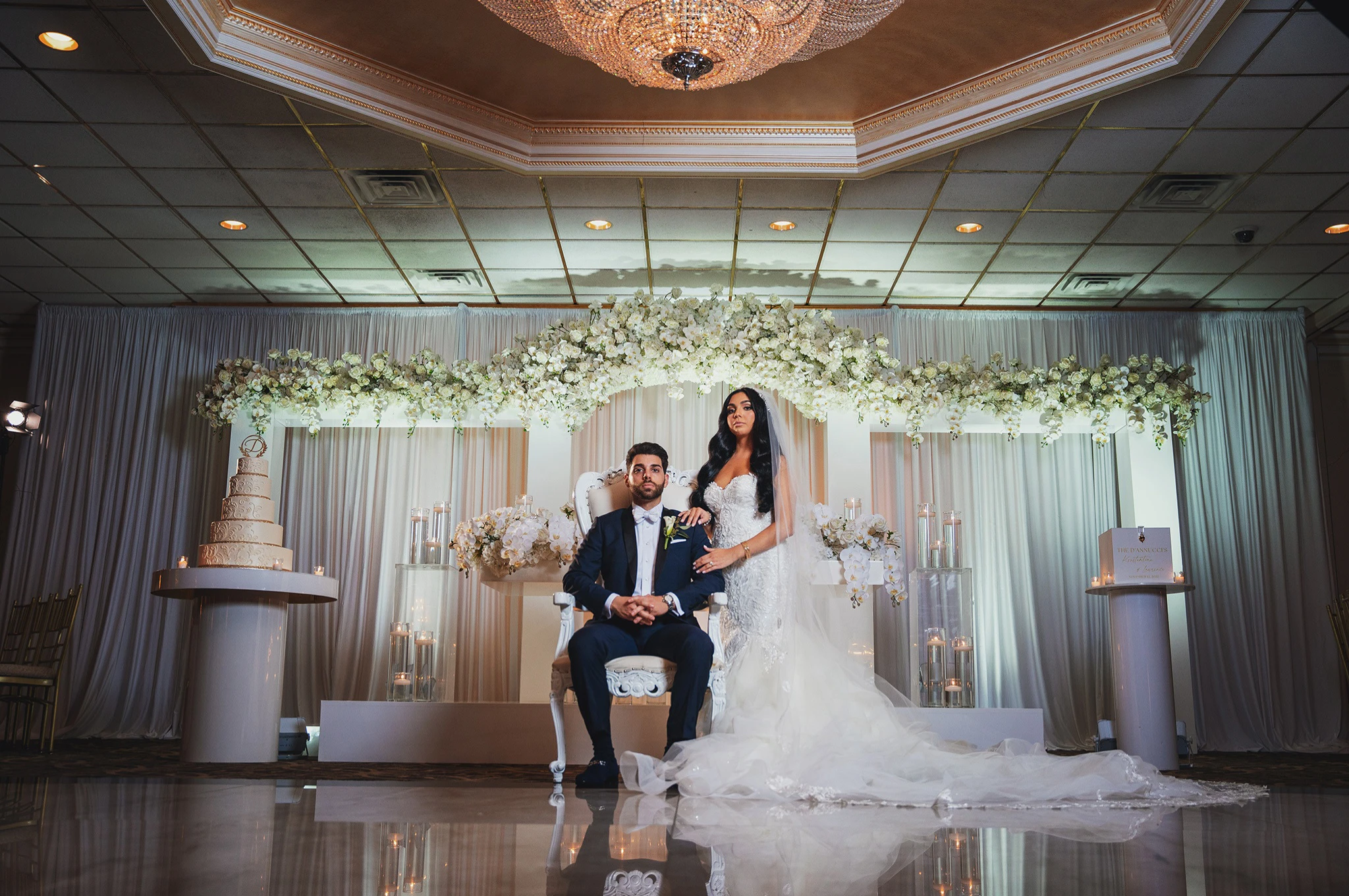 Photo of bride and groom posing at wedding