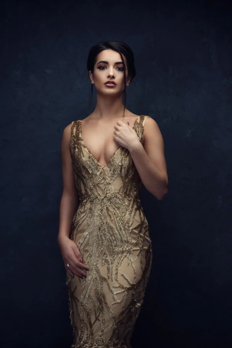 creative portrait of a woman in a gold dress