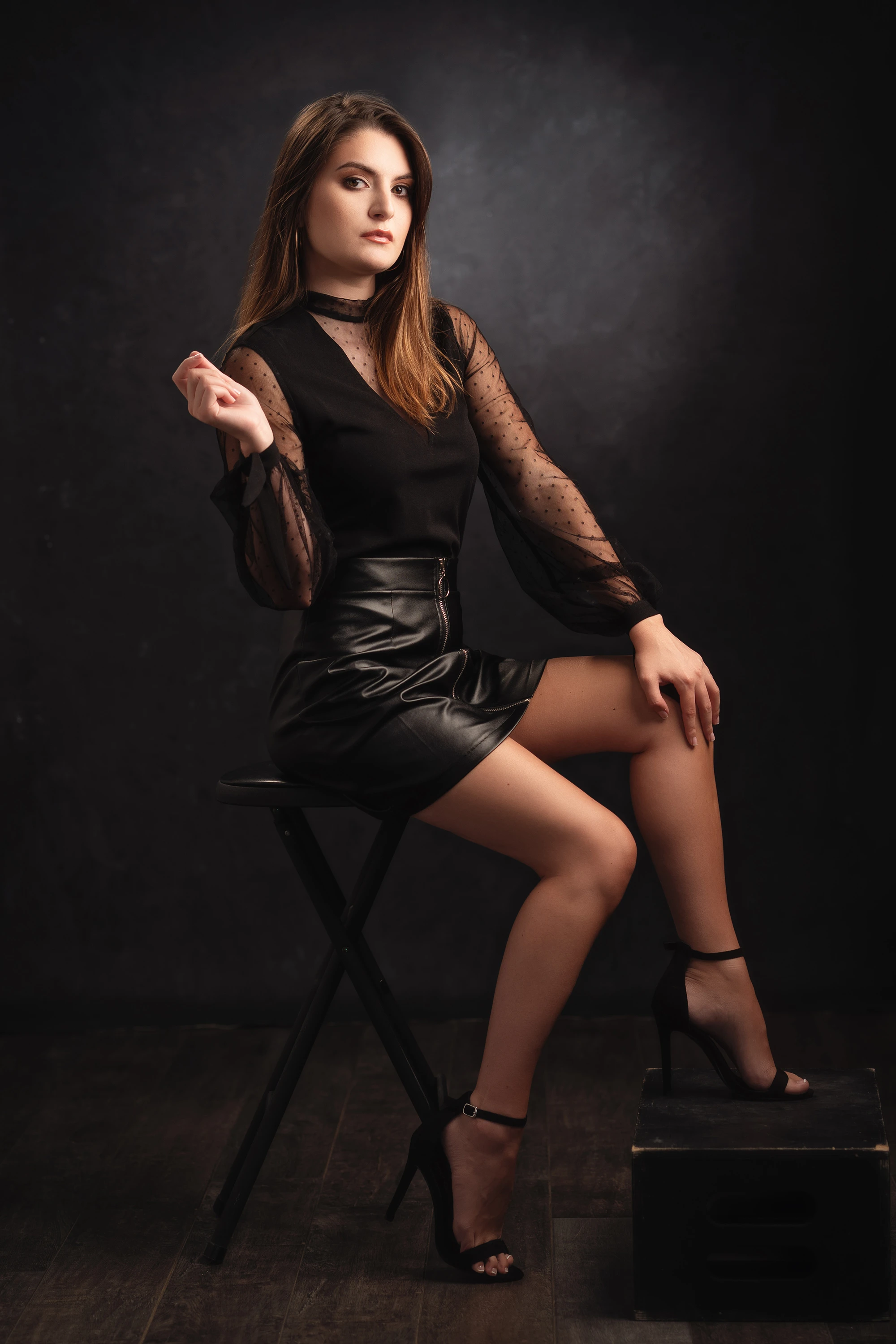 full body portrait of woman in black dress