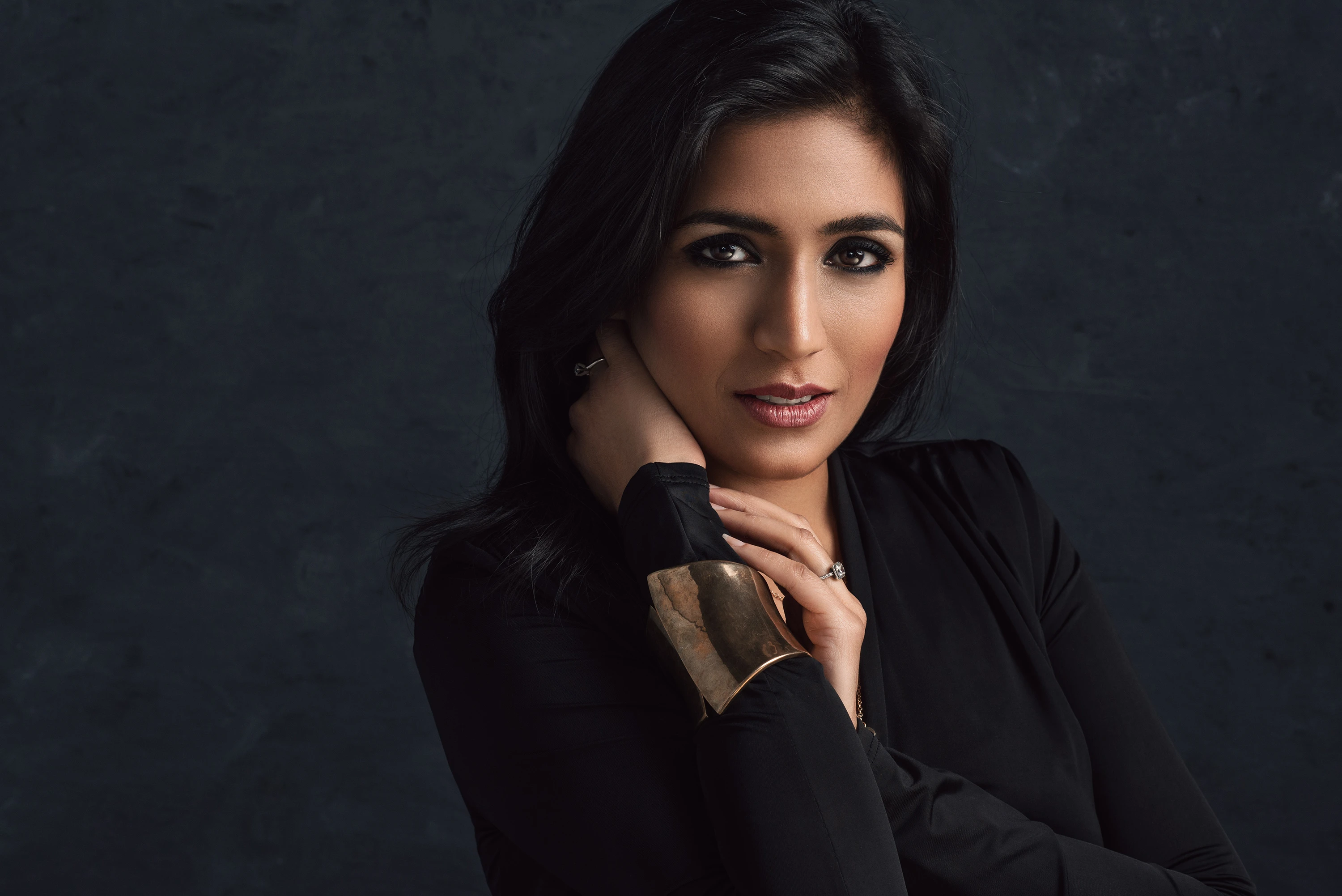 close up creative portrait of woman wearing black shirt
