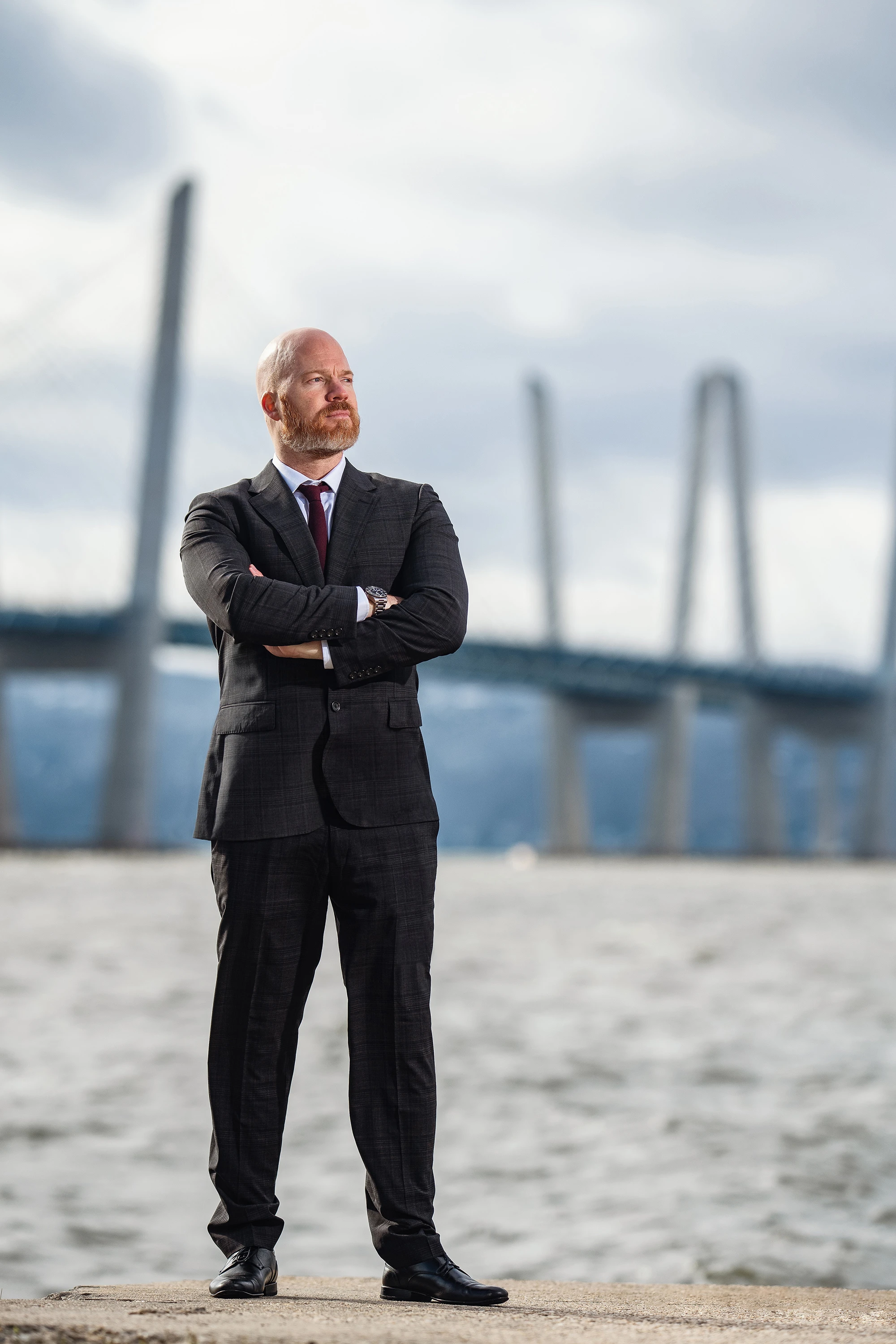 full body portrait headshot of man posing in front of Tappanzee Bridge