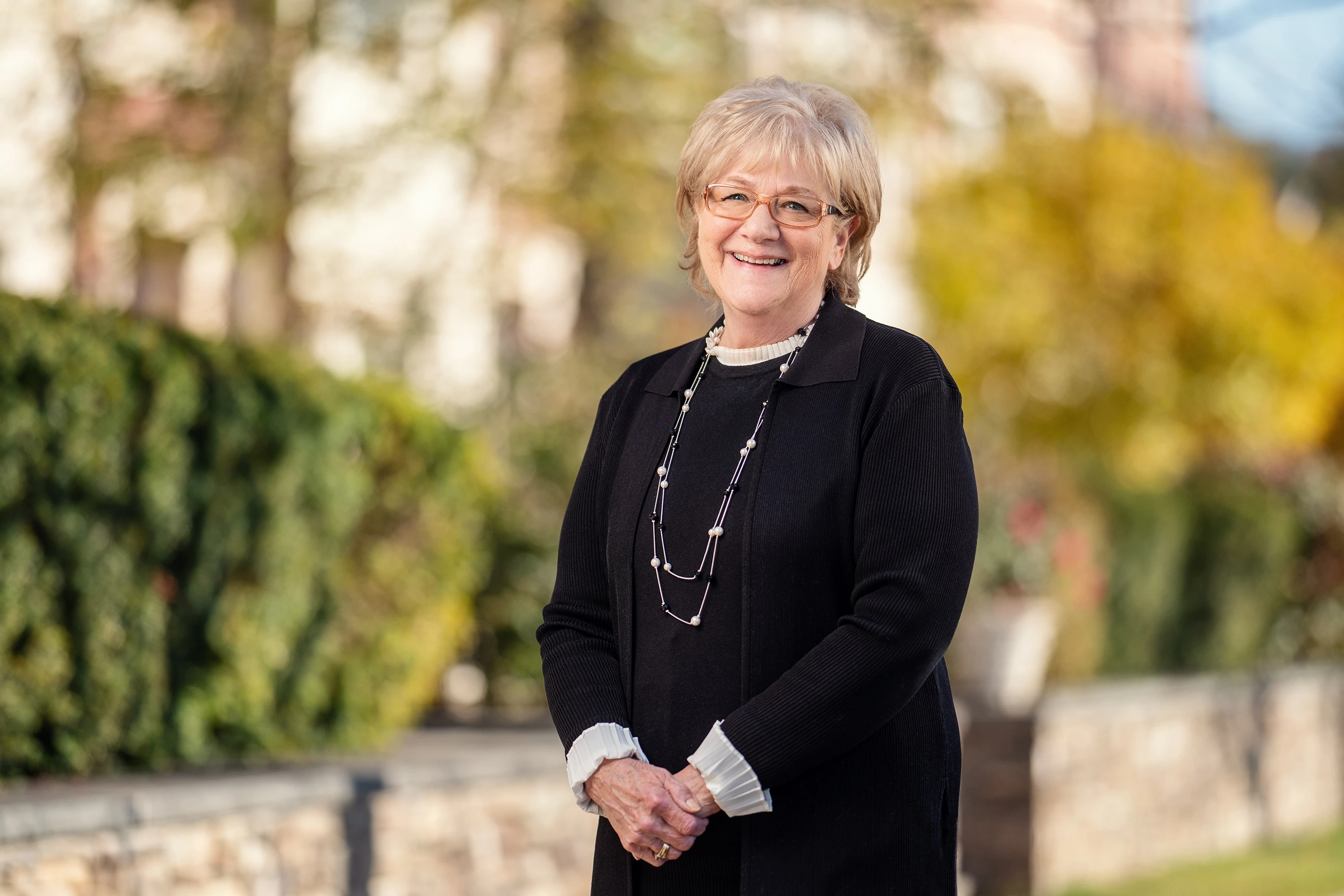 headshot of woman outdoors